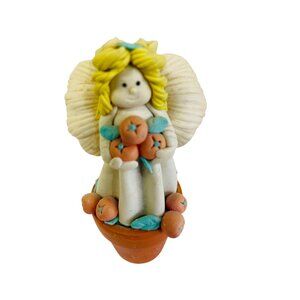 Polymer Clay Angel Figurine With Blonde Hair In Orange Pot Holding Fruits  4 1/2